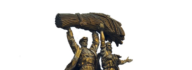 Soviet statue of a man and woman brandishing a wheat sheaf above their heads