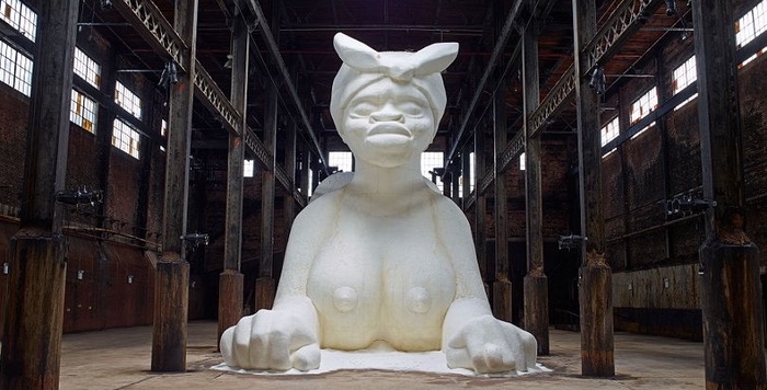 Part of Kara Walker's installation A Subtlety, or the Marvelous Sugar Baby an Homage to the unpaid and overworked Artisans who have refined our Sweet tastes from the cane fields to the Kitchens of the New World on the Occasion of the demolition of the Domino Sugar Refining Plant (2014)