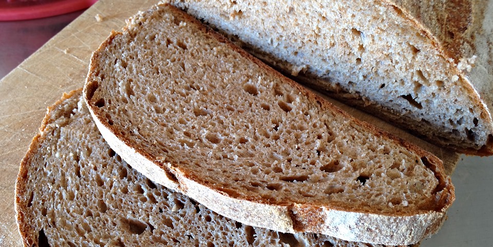 Slices of 100% wholewheat sourdough bread made with whole grain flour